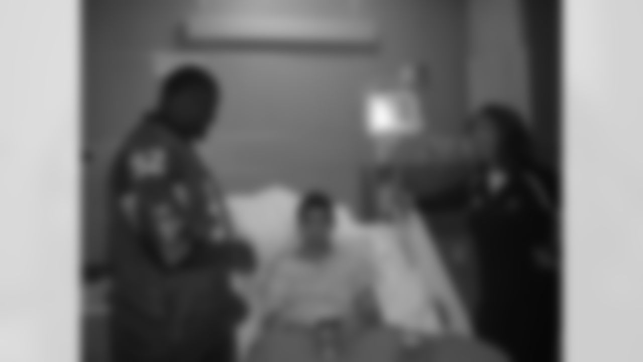 The Atlanta Facons visit Children's Healthcare of Atlanta // Atlanta, GA // Chauncey Davis visiting a patient //