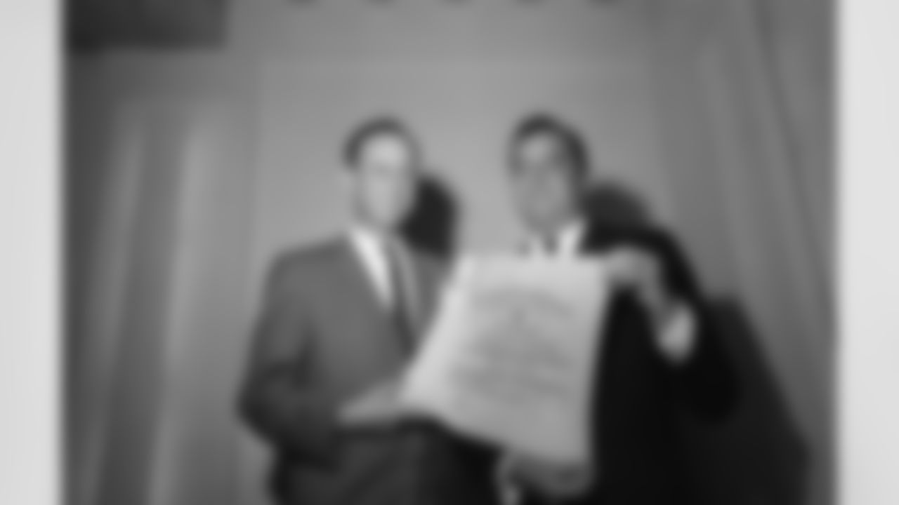 NFL Commissioner Pete Rozelle, left, presented the certificate of membership to Rankin Smith on Feb. 15, 1966 in Palm Beach, making the Atlanta Falcons the 15th NFL team