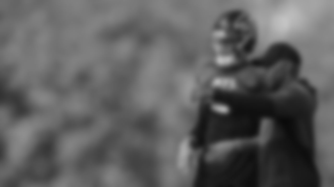 Atlanta Falcons quarterback Desmond Ridder #4 listens to coach Charles London during practice in Flowery Branch, Georgia, on Wednesday, November 2, 2022. (Photo by Shanna Lockwood/Atlanta Falcons)
