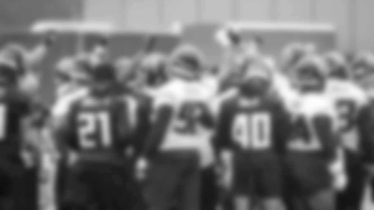 The Atlanta Falcons huddle up during practice at IBM Performance Field. (Photo by Kara Durrette/Atlanta Falcons)