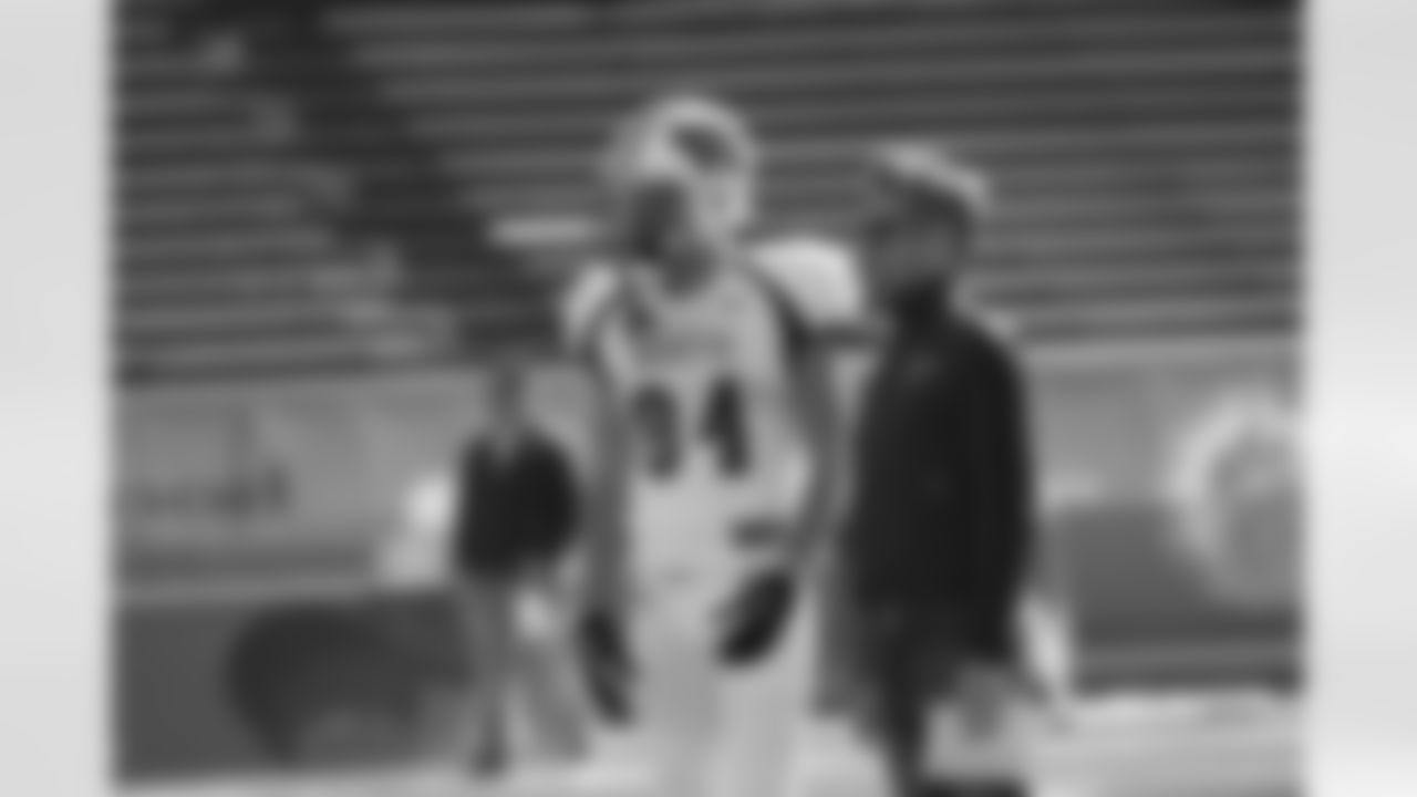 Falcons general manager Thomas Dimitroff chats with Wisconsin WR Jared Abbrederis