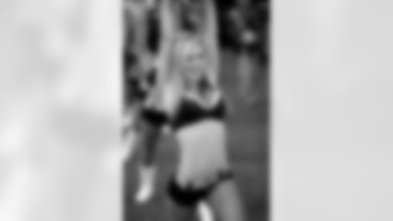 Atlanta Falcons Cheerleader Shauna K. smiles at the fans (PHOTOS: Art Morrison, Special to AtlantaFalcons.com)