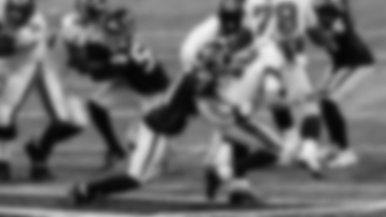 Atlanta Falcons safety Sharrod Neasman #41 sacks Tampa Bay Buccaneers quarterback Tom Brady #12 on December 20, 2020.