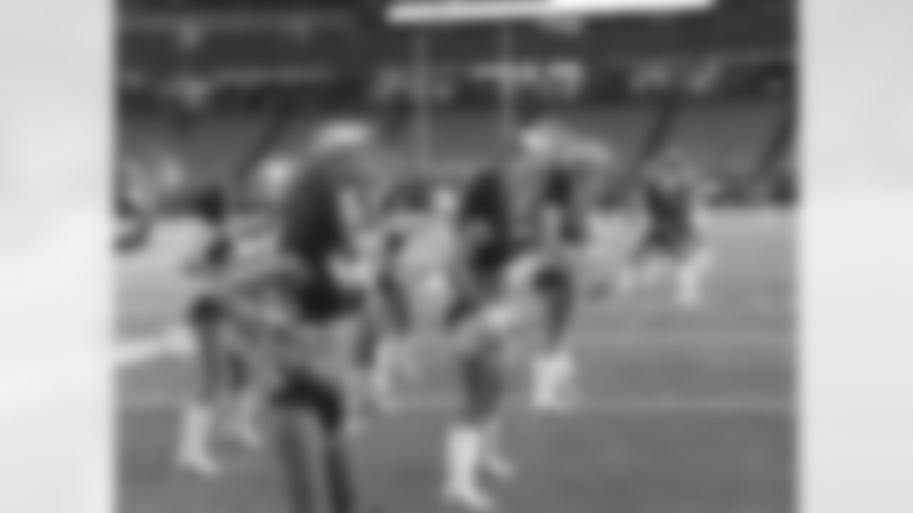 The Atlanta Falcons cheerleaders warm up pre-game