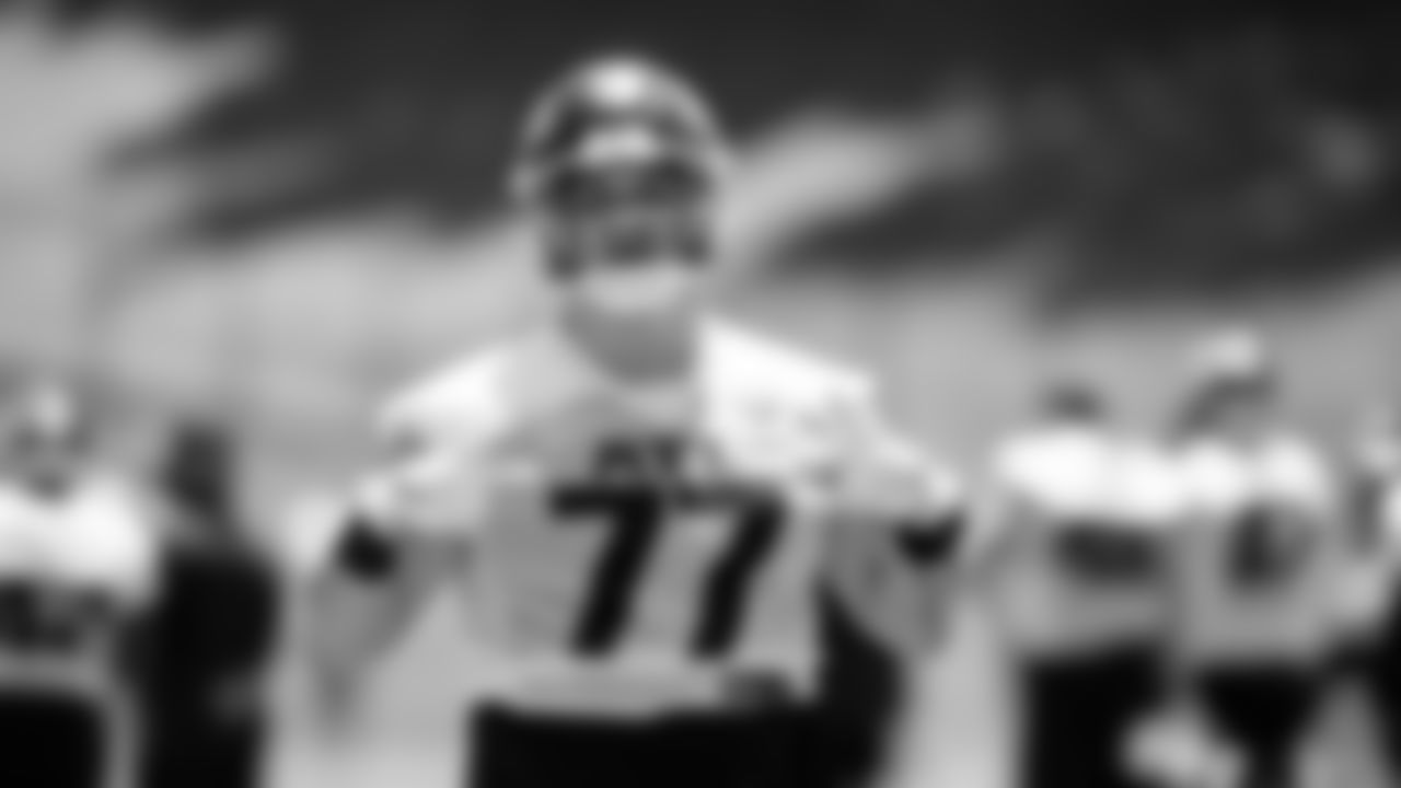 Atlanta Falcons offensive lineman Jalen Mayfield #77 gestures during organized team activities in Phase III of the Atlanta Falcons offseason program on June 4, 2021.