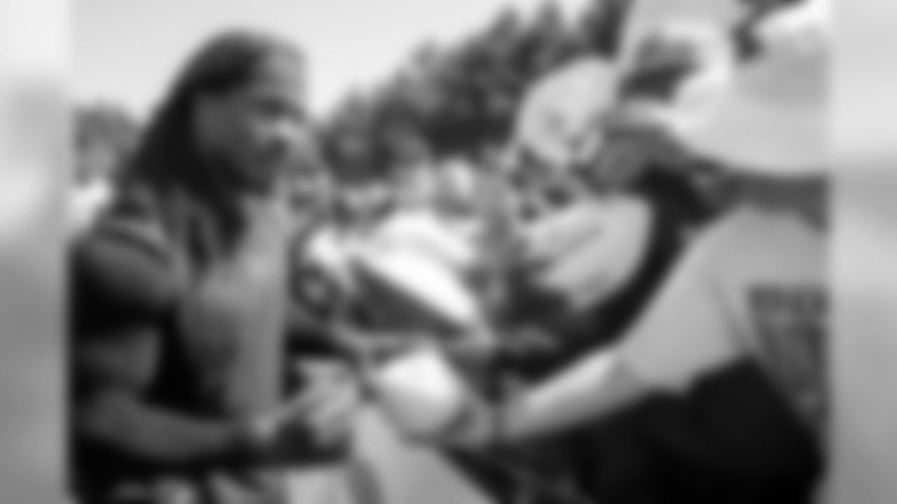 July 25, 2019 - RB Devonta Freeman signs autographs for fans on the fourth day of practice. (Photo by Kara Durrette/Atlanta Falcons)