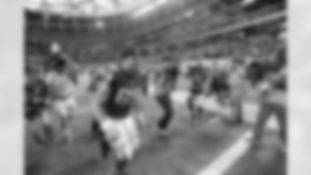 An emotional Tony Gonzalez exits the field after the win