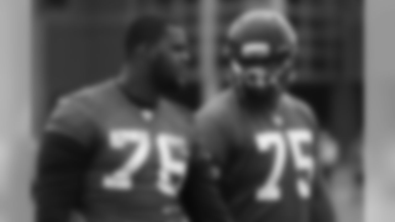 T Lamar Holmes and G Jon Asamoah