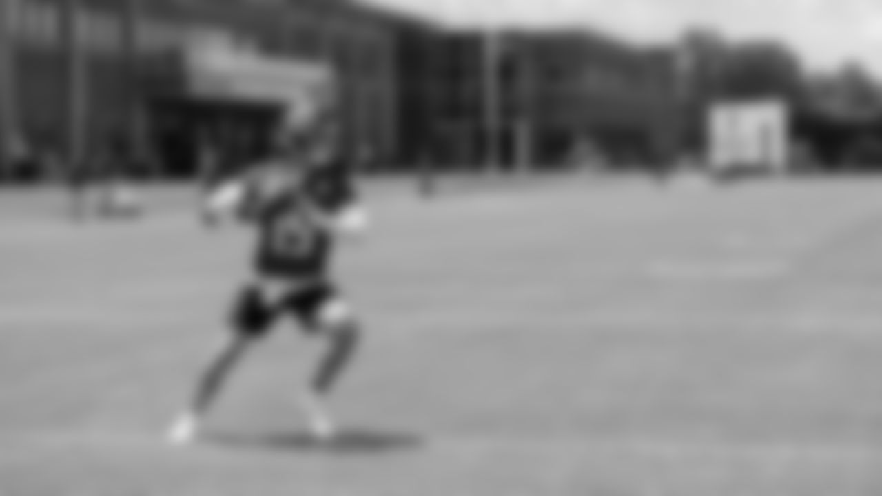 Atlanta Falcons quarterback Feleipe Franks #15 in action during the first practice of Atlanta Falcons rookie minicamp on May 14, 2021.