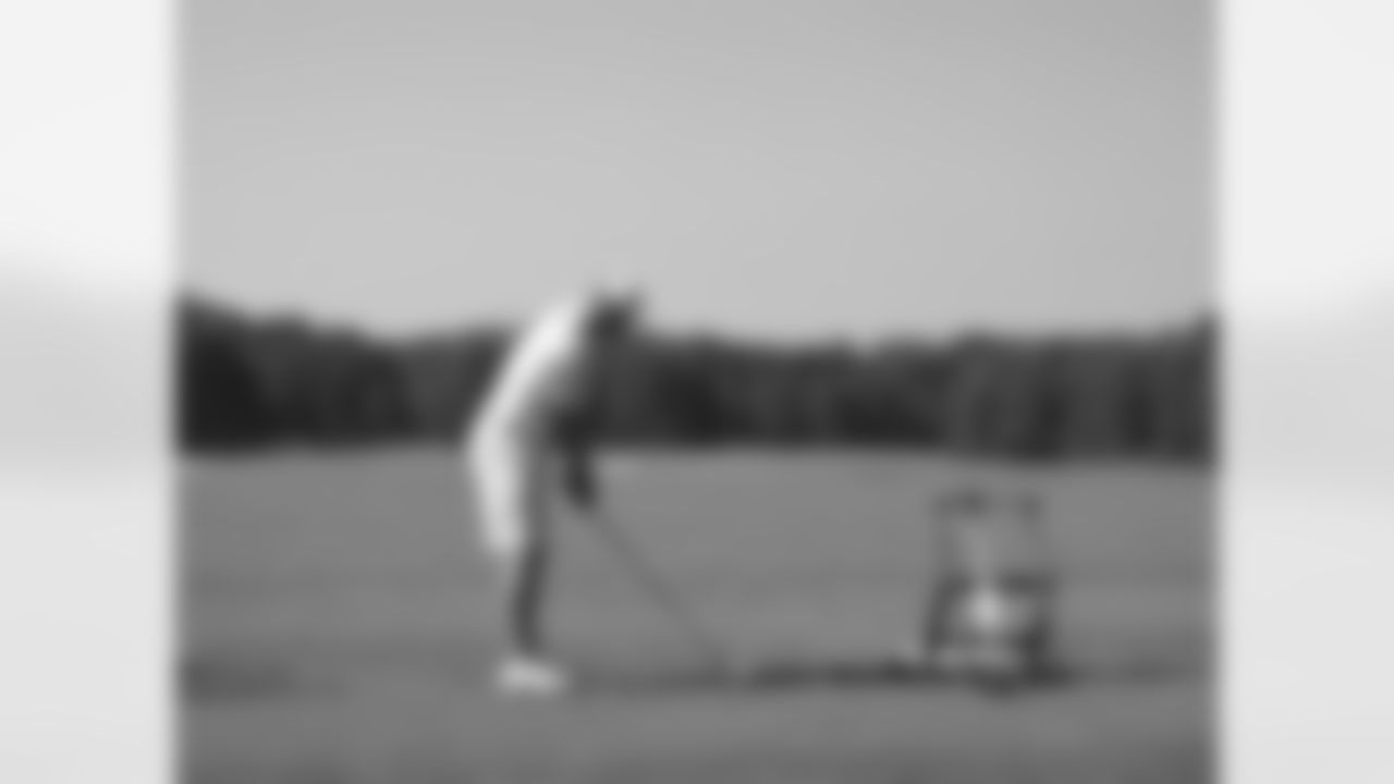 Chris Redman takes a few shots on the range // Verizon Wireless Network of Champions Golf Tournament - 2012 // June 18, 2012 // Suwanee, Ga., -