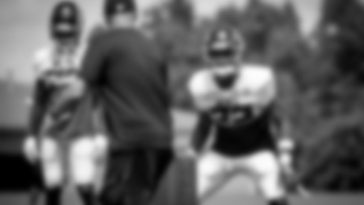 Atlanta Falcons strong safety Jaylinn Hawkins #32 listens to coach Chad Walker at IBM Performance Field on September 1, 2020 in Flowery Branch, GA. (Photo by Kara Durrette/Atlanta Falcons)