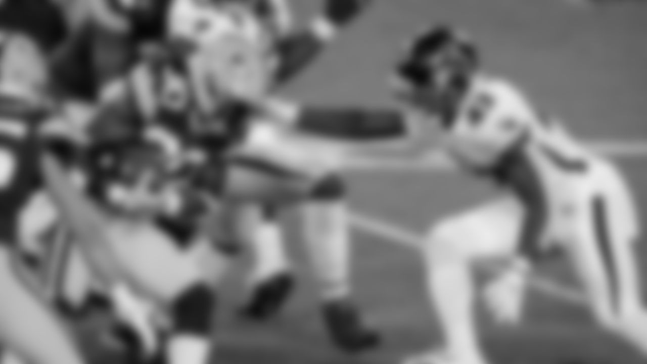 Atlanta Falcons linebacker Mykal Walker #43 makes a tackle on Green Bay Packers running back Jamaal Williams #30on October 5, 2020. (Photo by Cato Cataldo/AtlantaFalcons)