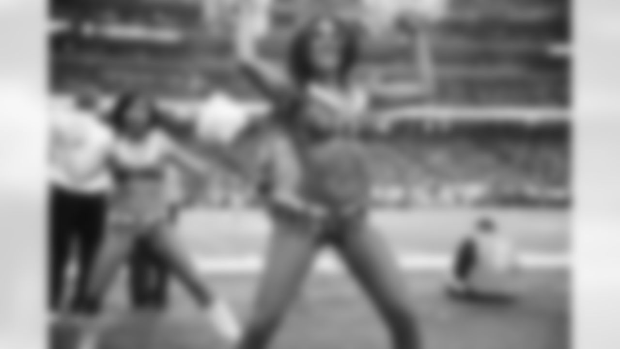 Atlanta Falcons Cheerleaders Lindsay M. and Ashley Y. perform on the sidelines