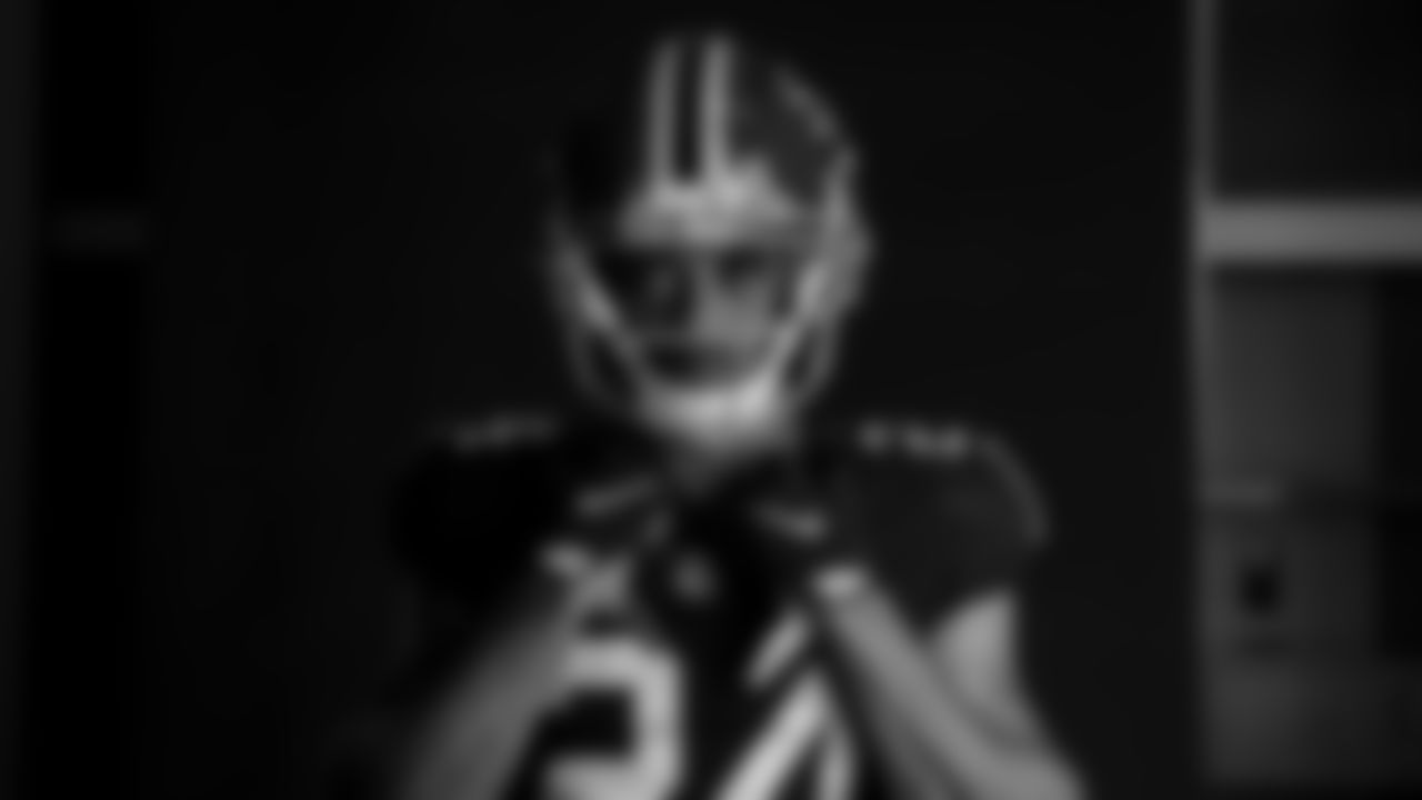 AJ Terrell poses for a portrait during the Red Helmet shoot at Mercedes-Benz Stadium in Atlanta, Georgia on Friday, May 17, 2022. (Photo by Brandon Magnus/Atlanta Falcons)