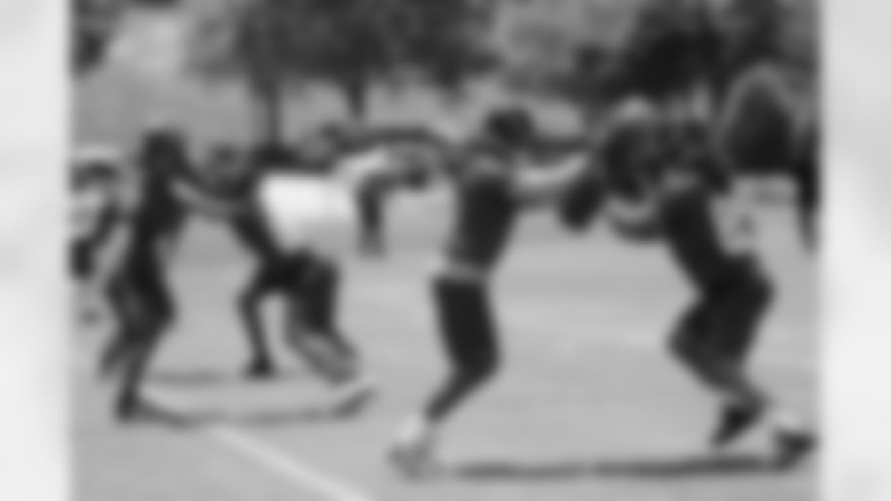 Rookies work on engaging and shedding blocks during kickoff period