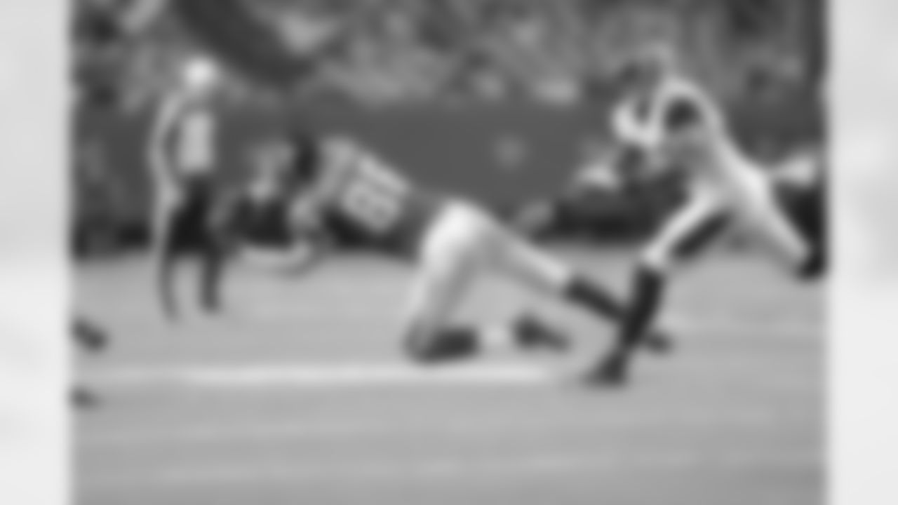 TE Chase Coffman stretches out for the ball