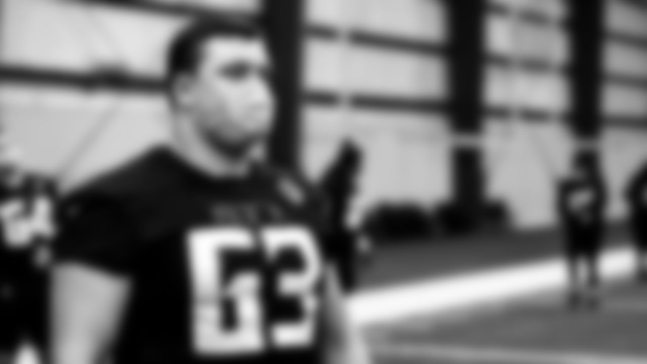 Atlanta Falcons offensive guard Chris Lindstrom #63 looks on during practice in the indoor facility at IBM Performance Field.