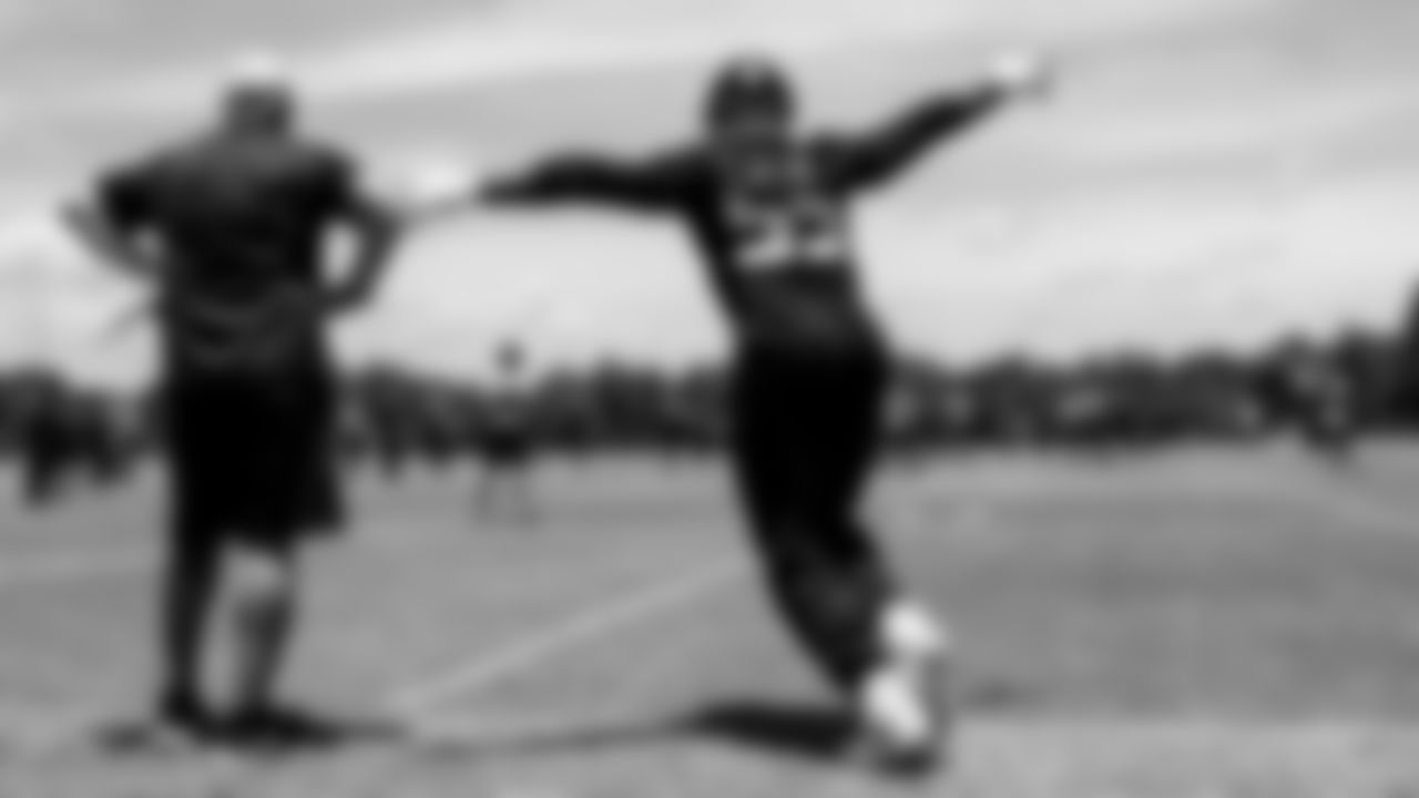 Atlanta Falcons defensive end Steven Means #55 celebrates a defensive play during organized team activities in Phase III of the Atlanta Falcons offseason program on June 4, 2021.