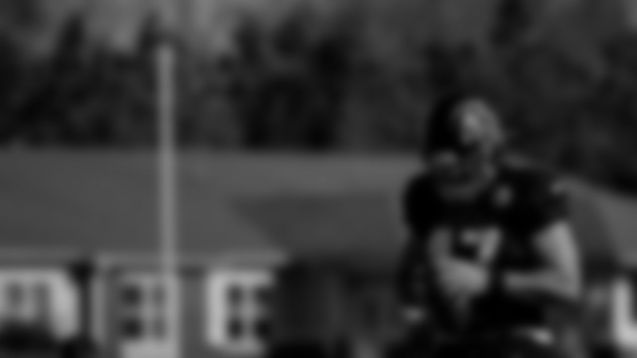 Atlanta Falcons long snapper Josh Harris #47 looks on during practice at IBM Performance Field.