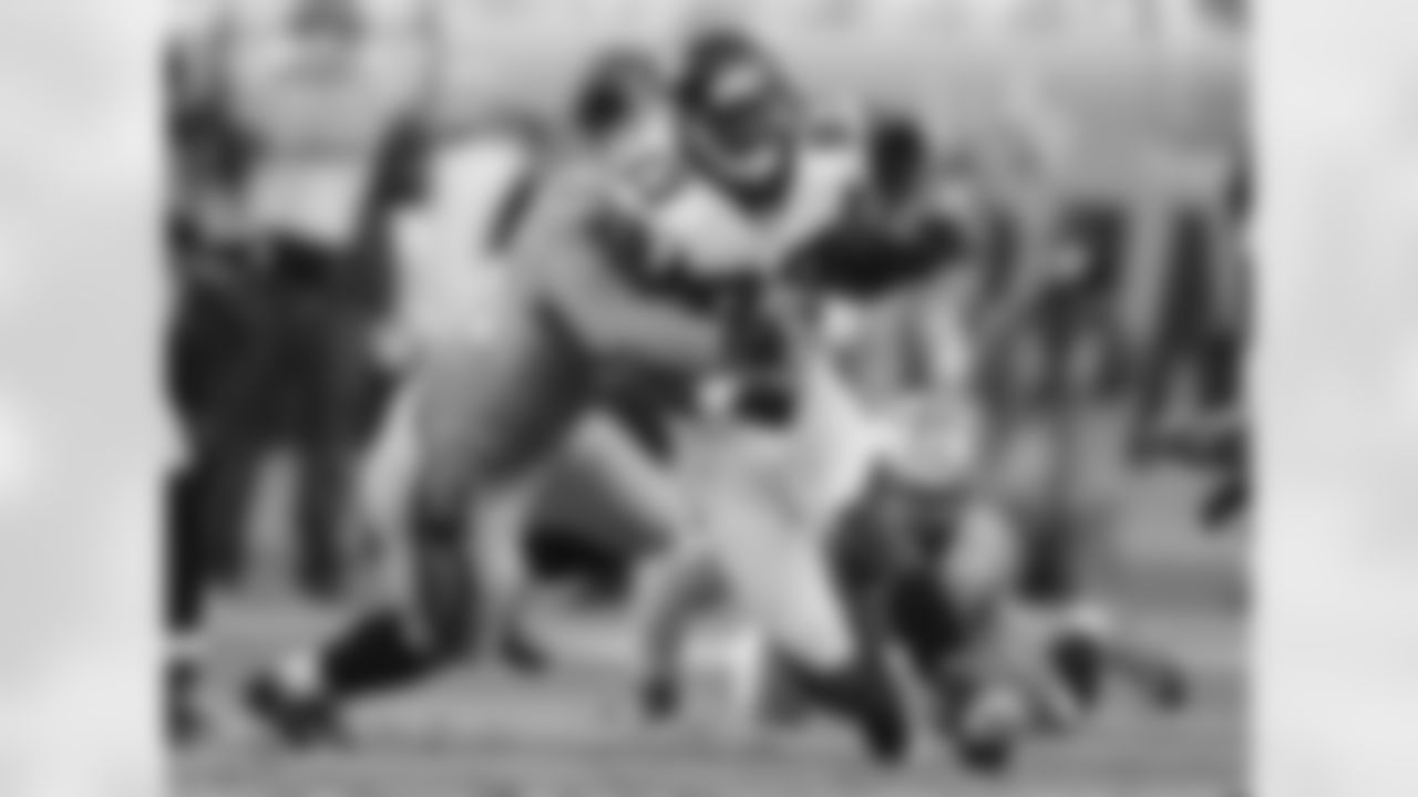 WR Harry Douglas works to move past Panthers LB A.J. Klein