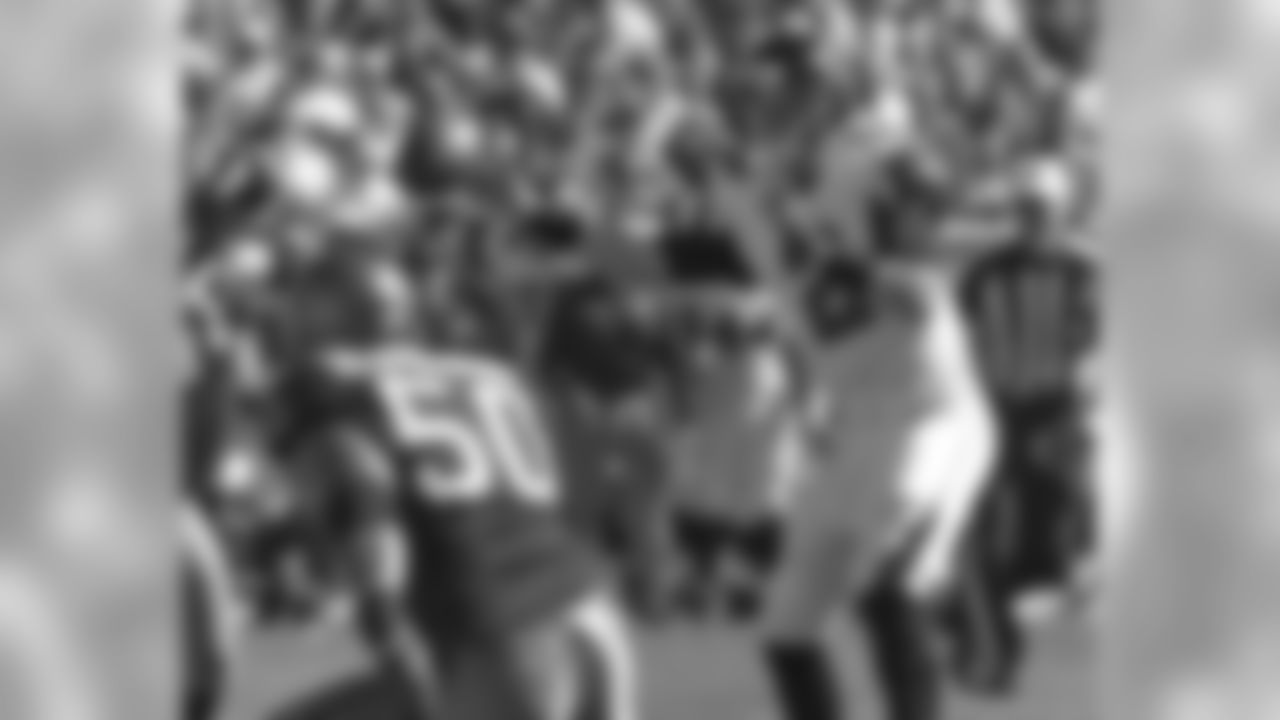 QB Matt Ryan delivers a shovel pass past the Bucs front line