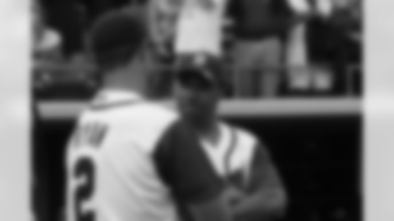 Matt Ryan chats with former Patriots safety Rodney Harrison on Tuesday night