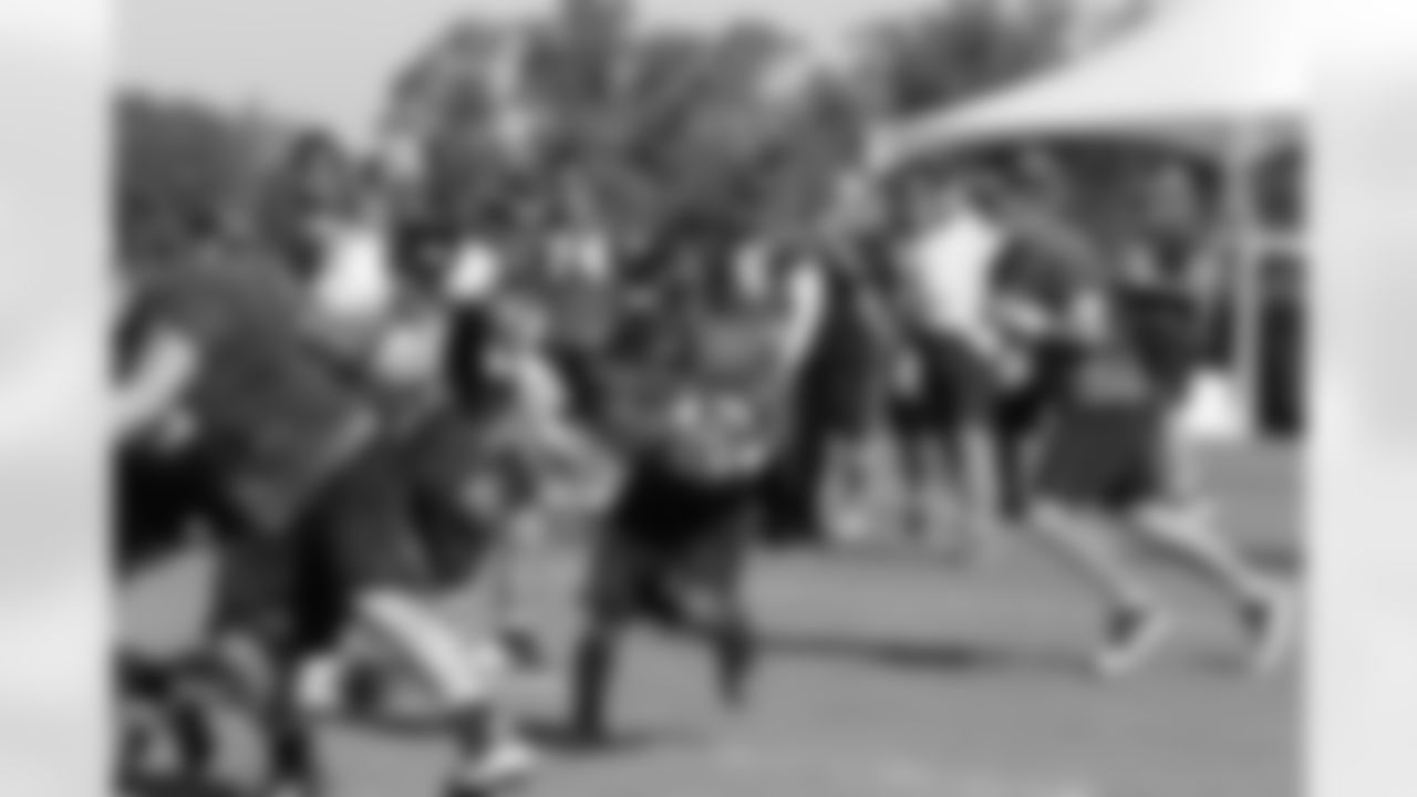 RB Antone Smith takes a carry // 2011 Russell Athletic Training Camp - Day 10 // August 10, 2011 // Flowery Branch, Ga. —
