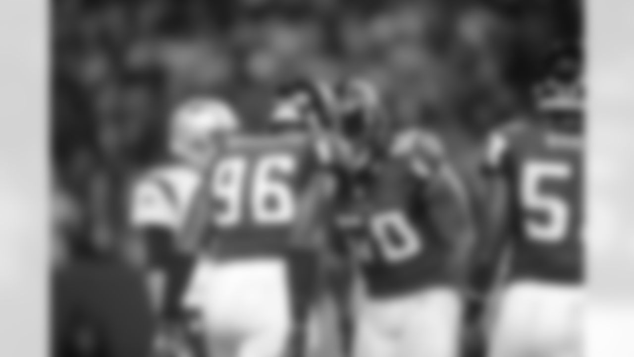 DE Jonathan Massaquoi and DE Osi Umenyiora