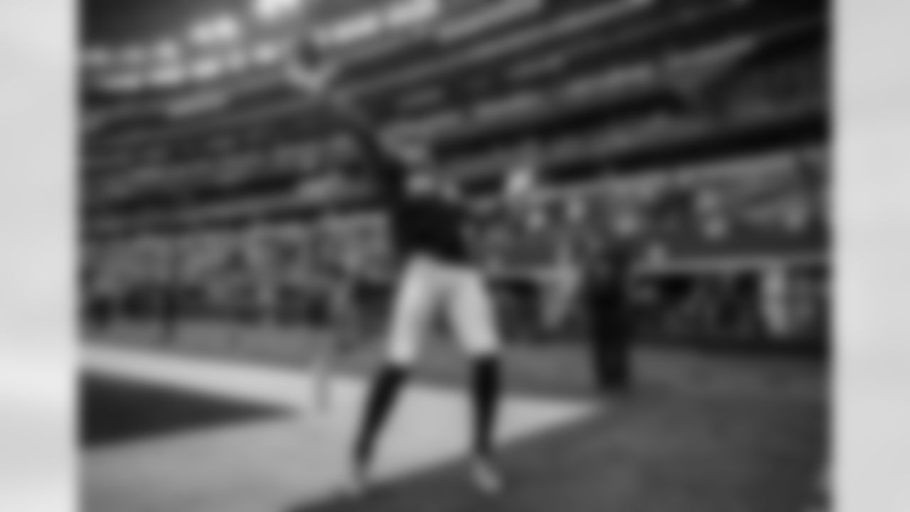 Atlanta Falcons running back Cordarrelle Patterson #84 plays catch with a fan prior to a game against the Dallas Cowboys at AT&T Stadium in Arlington, Texas on Sunday, November 14, 2021. (Photo by Ben Ludeman/Atlanta Falcons)