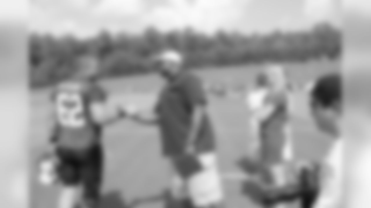 C Todd McClure shakes hands with former Falcon Alge Crumpler // 2012 Atlanta Falcons Minicamp - Day 2 // June 20, 2012 // Flowery Branch, Ga. -