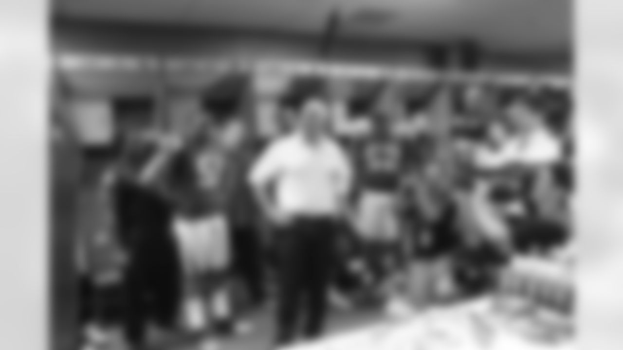 Head Coach Mike Smith addresses the team after the victory