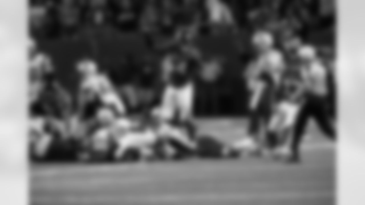 The Falcons point to the refs that they have recovered a fumble