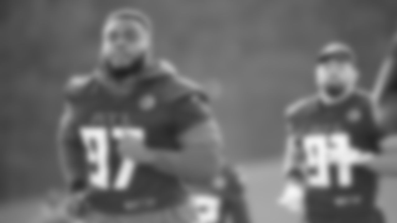 Atlanta Falcons defensive tackle Grady Jarrett #97 jogs during field work drills in Phase II of the Atlanta Falcons offseason program on May 20, 2021.