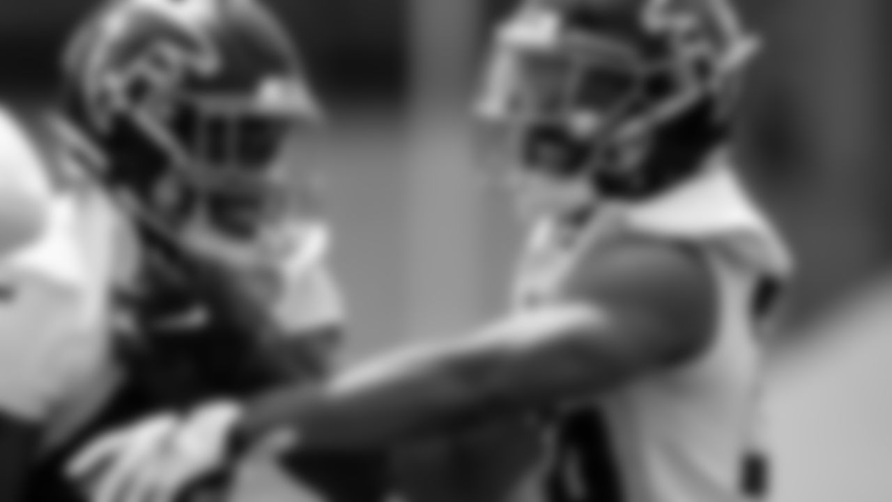 Atlanta Falcons running back Caleb Huntley #42 works with running back Tony Brooks-James #36 during organized team activities in Phase III of the Atlanta Falcons offseason program on May 25, 2021.