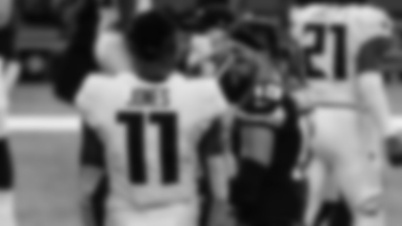 Atlanta Falcons wide receiver Julio Jones #11 talks with Minnesota Vikings wide receiver Adam Thielen #19 after the game on October 18, 2020. (Photo by Cato Cataldo/AtlantaFalcons)