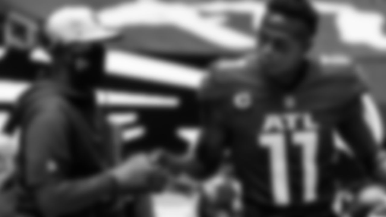 Atlanta Falcons head coach Raheem Morris and wide receiver Julio Jones #11 are shown before the game against the Detroit Lions on October 25, 2020. (Photo by Rob Foldy/Atlanta Falcons)