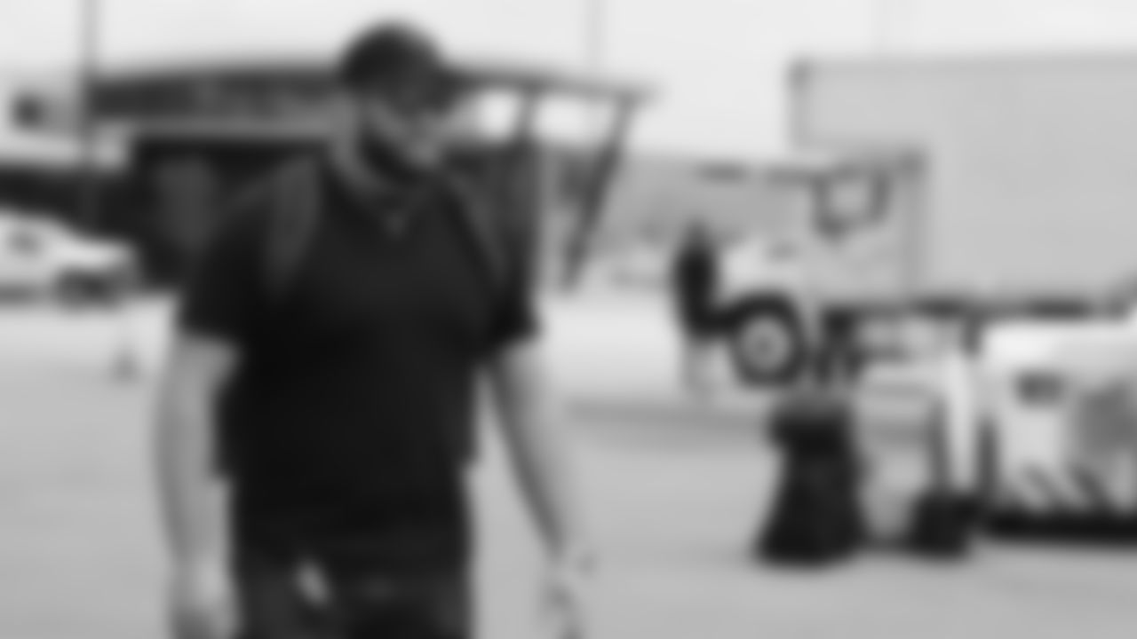 Atlanta Falcons offensive lineman Colby Gossett #66 boards the plane in Atlanta for the game against the Detroit Lions on Thursday, August 11, 2022. (Photo by Shanna Lockwood/Atlanta Falcons)