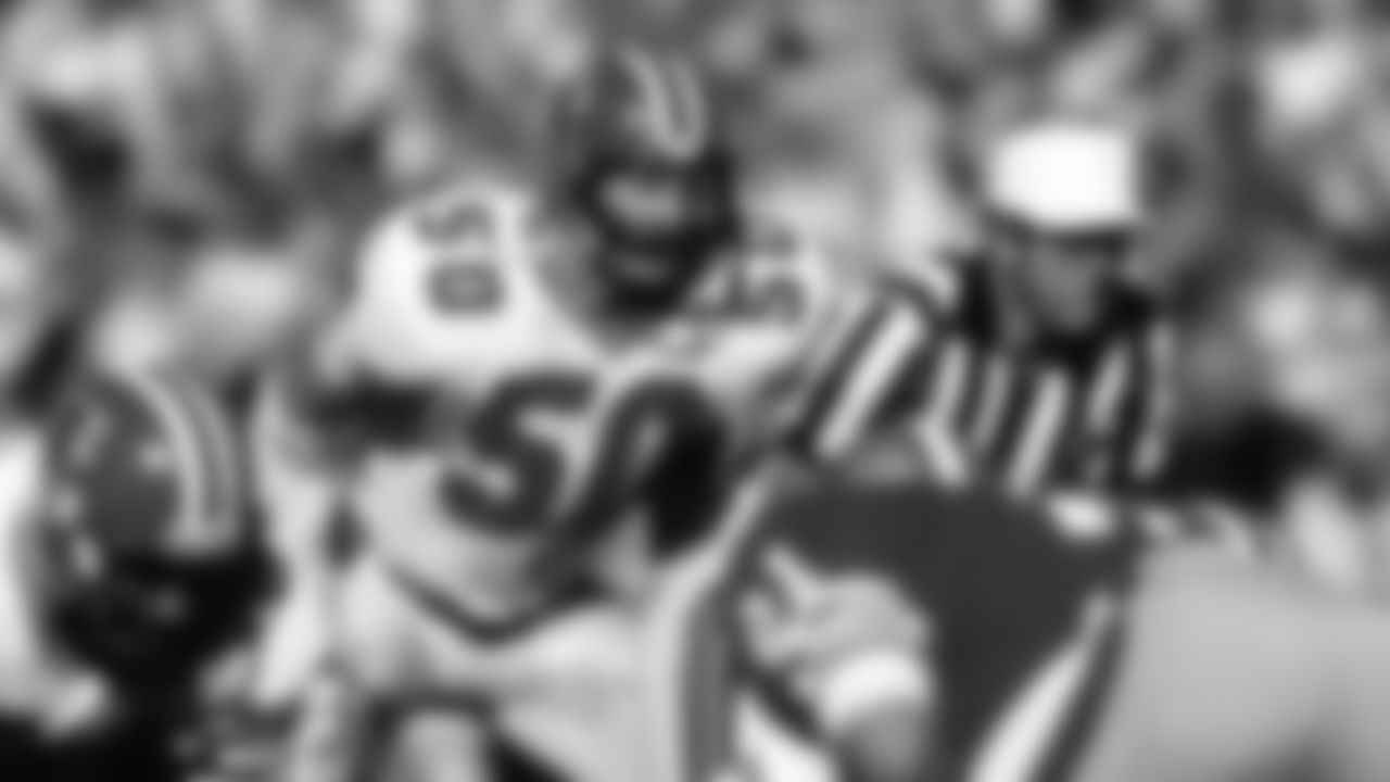 Atlanta Falcons linebacker Buddy Curry (50) waits for the snap during an NFL game against the San Francisco 49ers on Sunday, Nov. 23, 1986, in San Francisco. The 49ers won the game, 20-0. (AP Photo/Greg Trott)