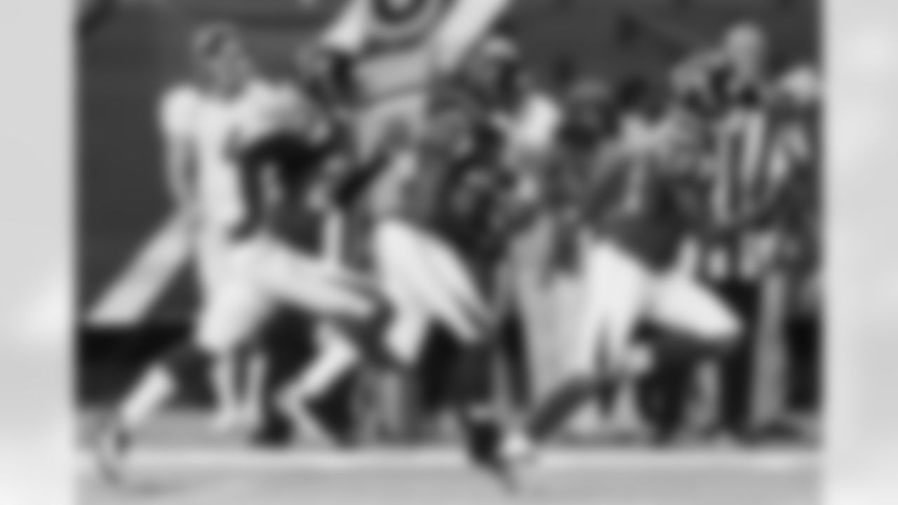 S William Moore returns an interception
