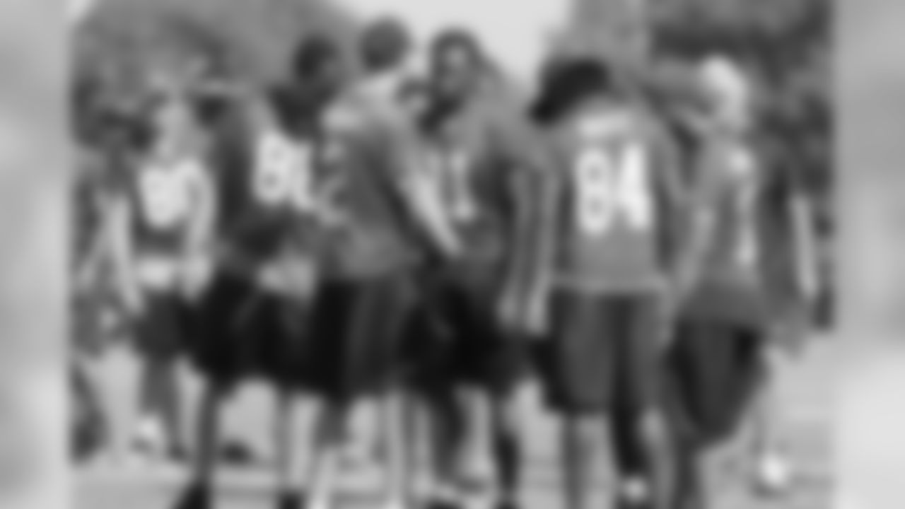 The offense huddles // 2011 Russell Athletic Training Camp - Day 1 // July 29, 2011 // Flowery Branch, Ga. —