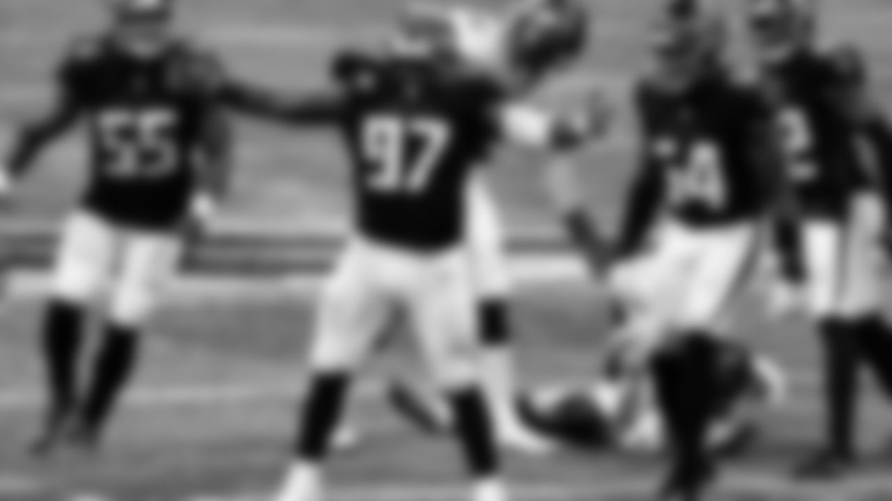 Atlanta Falcons defensive tackle Grady Jarrett #97 celebrates after sacking Tampa Bay Buccaneers quarterback Tom Brady #12 during the fourth quarter against the Tampa Bay Buccaneers on December 20, 2020.