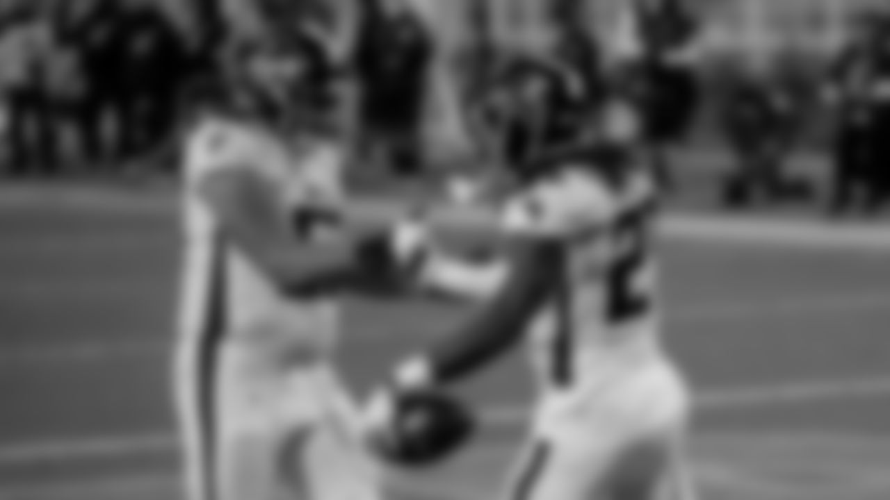 Atlanta Falcons running back Todd Gurley II #21 celebrates scoring a touchdown with guard Chris Lindstrom #63 on October 5, 2020. (Photo by Cato Cataldo/AtlantaFalcons)