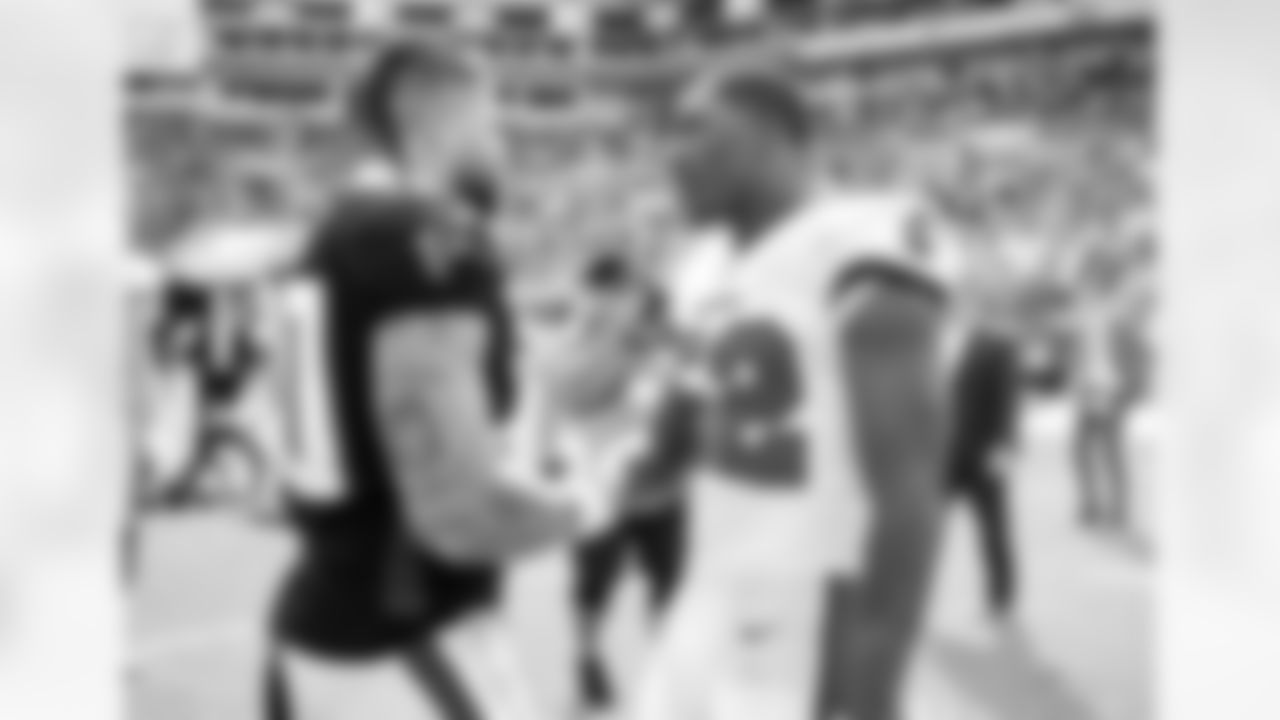 Atlanta Falcons fullback Keith Smith #40 is seen greeting players after the game against the Tampa Bay Buccaneers at Raymond James Stadium in Tampa, Florida on Sunday, October 9, 2022. (Photo by Shanna Lockwood/Atlanta Falcons)