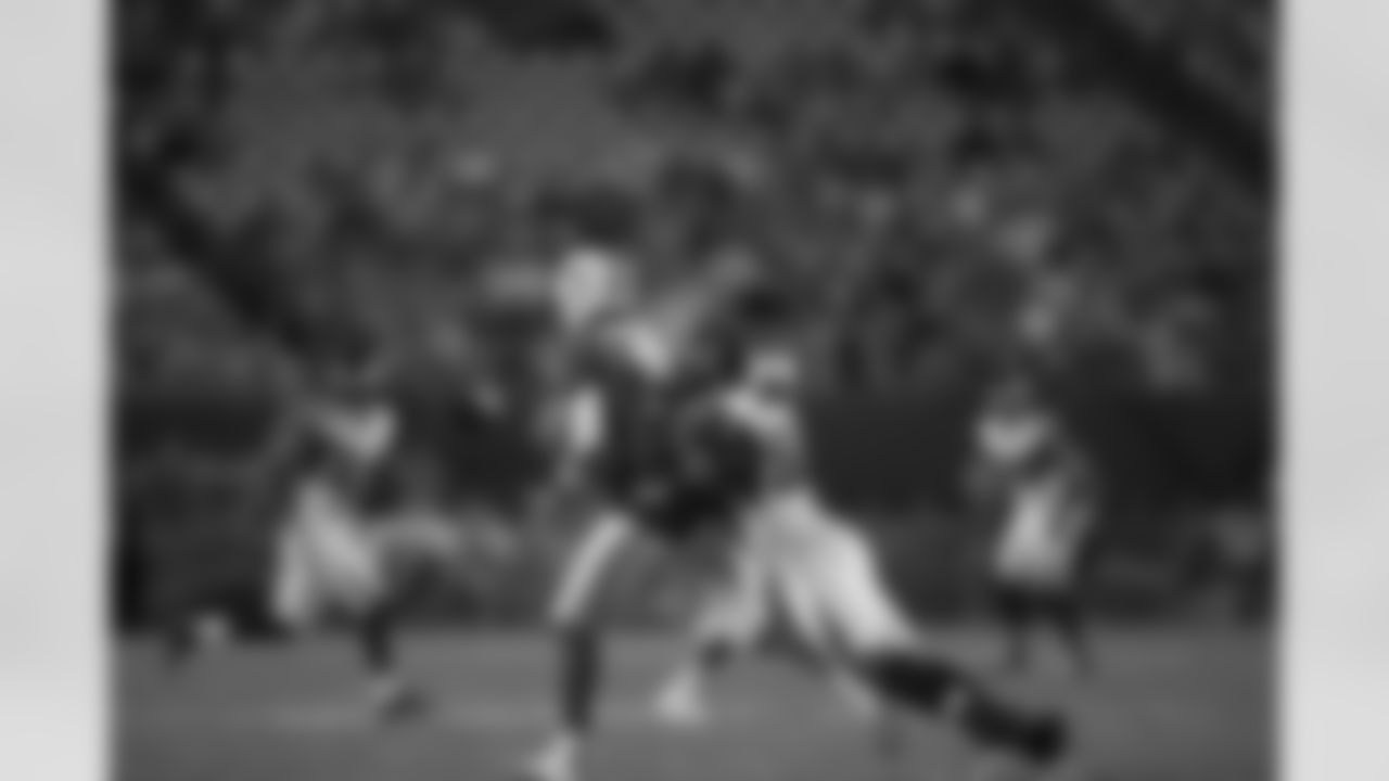 Defensive end Lawrence Sidbury makes the tackle // Falcons at Dolphins - 2012