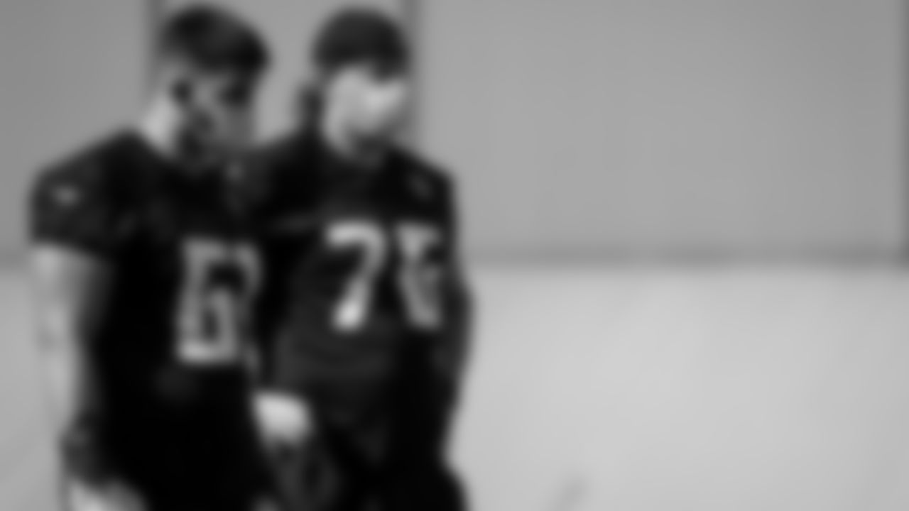 Atlanta Falcons center Matt Hennessy #61 and offensive tackle Kaleb McGary #76 looks on during practice at IBM Performance Field.