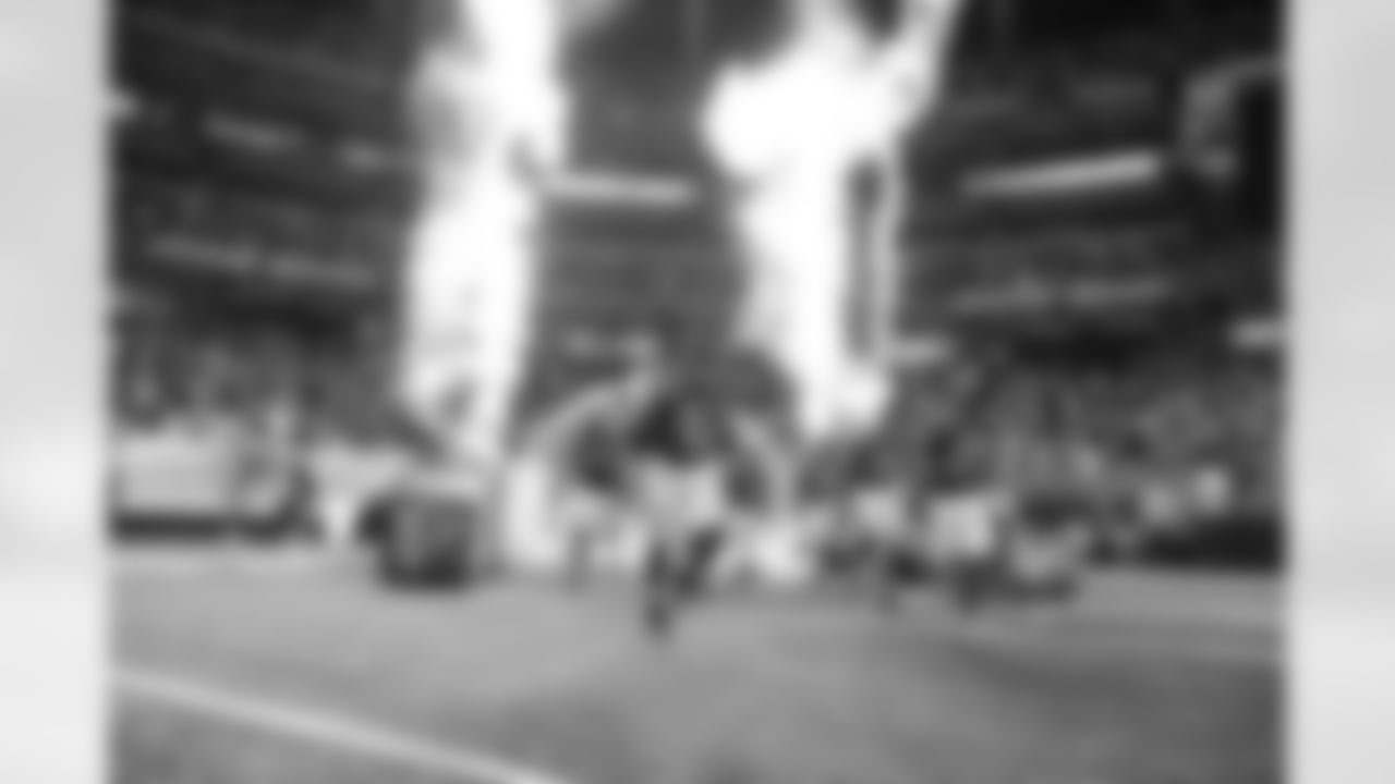 The Atlanta Falcons enter the field during pregame introductions