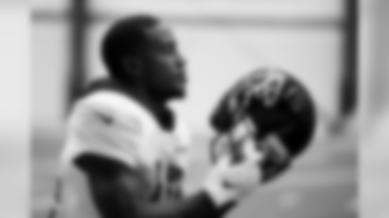 Atlanta Falcons wide receiver Brandon Powell #15 puts on his helmet during practice. (Photo by Kara Durrette/Atlanta Falcons).