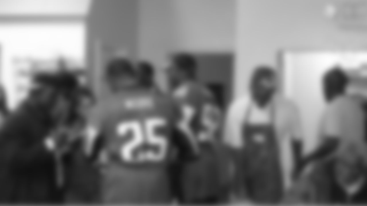 The Atlanta Falcons Rookie Club and Kroy Biermann served Thanksgiving Lunch