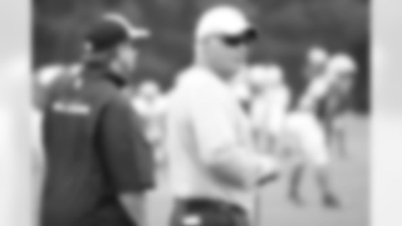 Tight ends coach, Chris Scelfo, and head coach, Mike Smith
