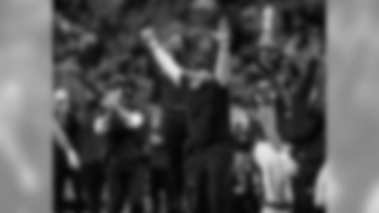 Atlanta Falcons head coach Dan Quinn celebrates from the sideline during the first half of the game against the Jacksonville Jaguars at Mercedes-Benz Stadium in Atlanta, GA, on Sunday December 22, 2019. (Photo by Kyle Hess/Atlanta Falcons)